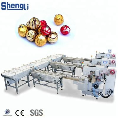 Máquina de enrolar de fluxo personalizada controlada por PLC para bola de wafer de chocolate